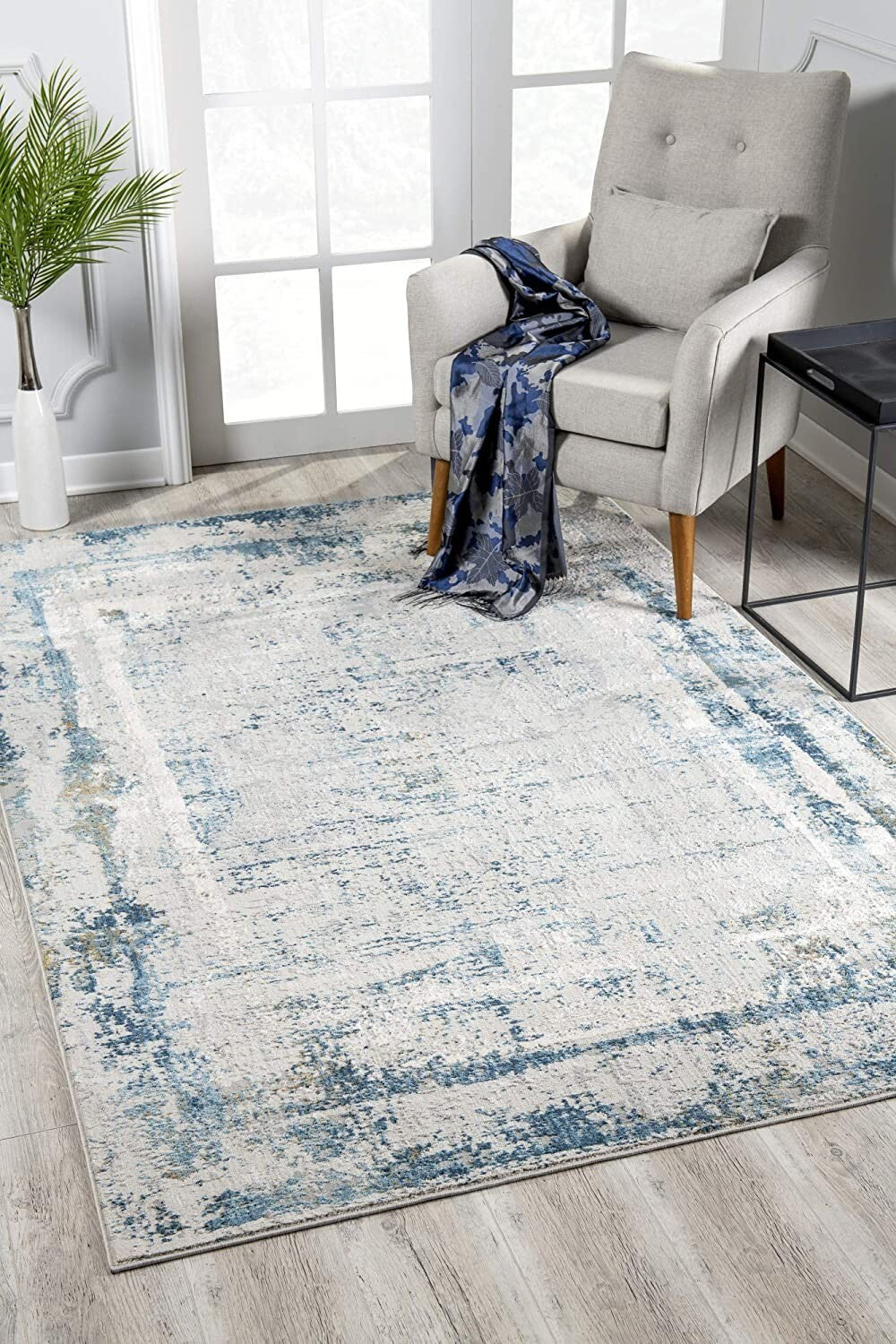 8' X 10' Blue and Ivory Abstract Area Rug