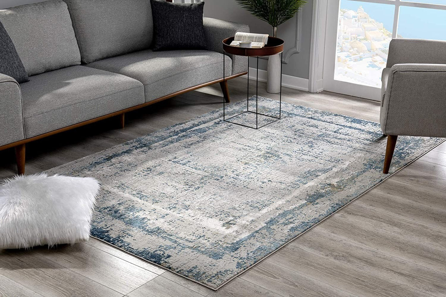 8' X 10' Blue and Ivory Abstract Area Rug