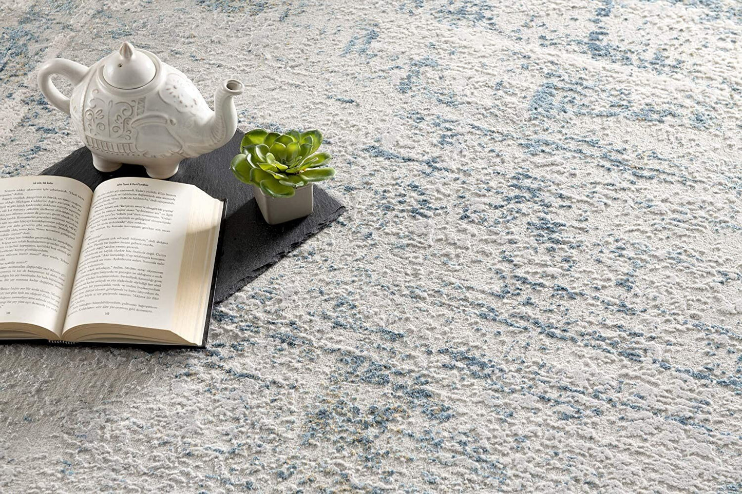 8' X 10' Blue and Ivory Abstract Area Rug