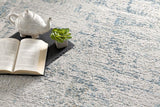 8' X 10' Blue and Ivory Abstract Area Rug