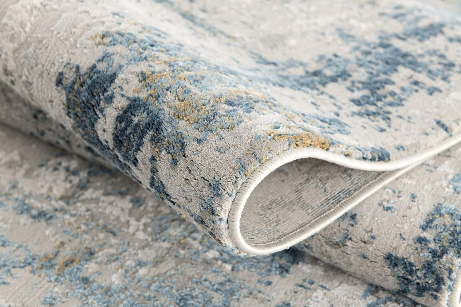 8' X 10' Blue and Ivory Abstract Area Rug