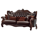 93" Brown Faux Leather Sofa And Toss Pillows With Burgundy Legs