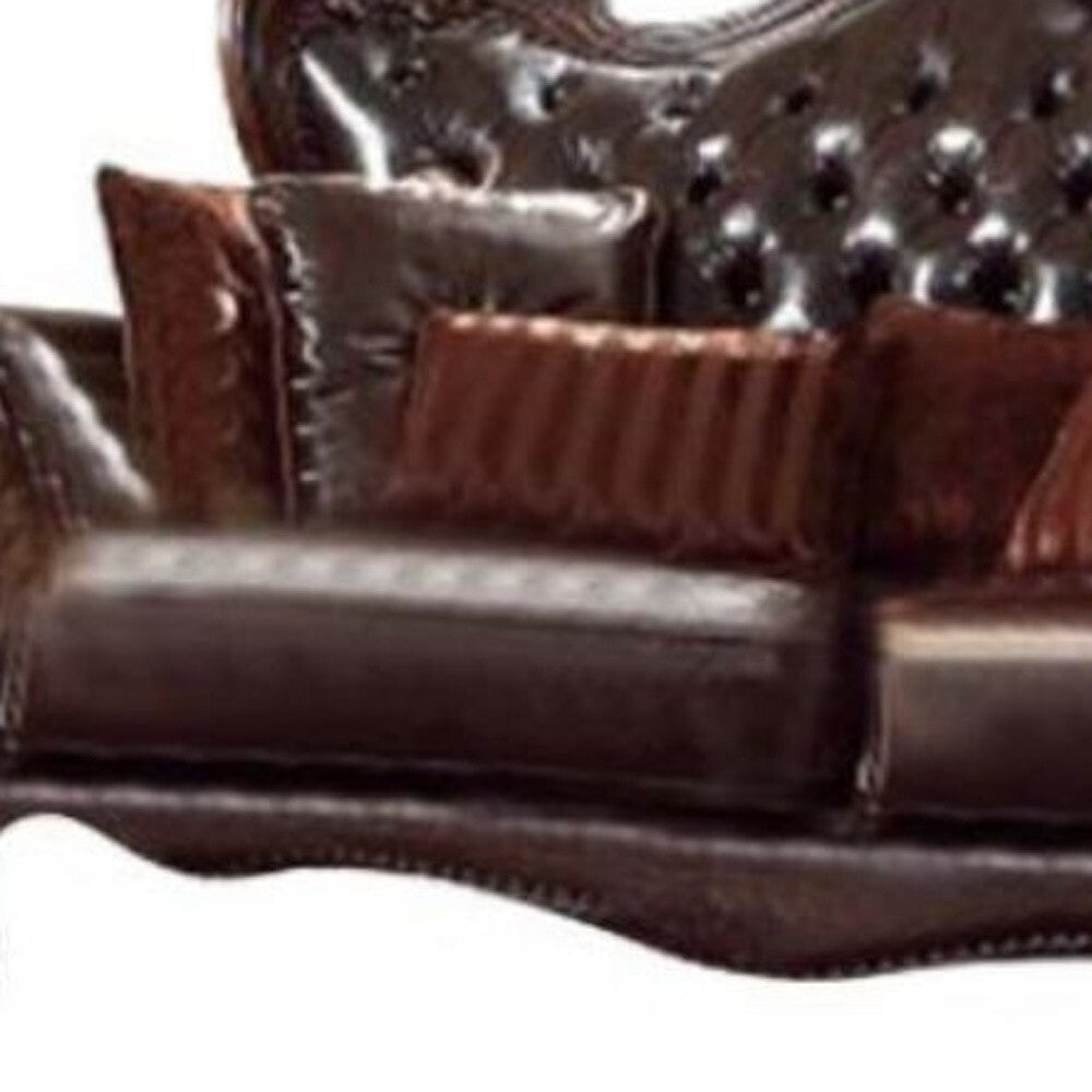 93" Brown Faux Leather Sofa And Toss Pillows With Burgundy Legs