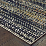 10' X 13' Black Navy Gold Ivory And Blush Abstract Power Loom Stain Resistant Area Rug