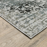 6' X 9' Ivory Grey Charcoal Blue And Navy Abstract Power Loom Stain Resistant Area Rug