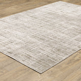 10' X 13' Beige Grey Ivory Tan And Brown Abstract Power Loom Stain Resistant Area Rug