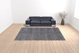 10' X 13' Blue and Ivory Power Loom Area Rug