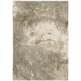 7' X 10' Gray and Ivory Abstract Power Loom Area Rug