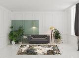 7' X 10' Blue and Ivory Abstract Power Loom Area Rug