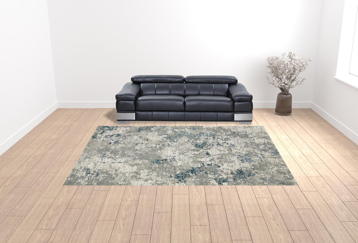 10' X 13' Blue and Beige Abstract Power Loom Area Rug
