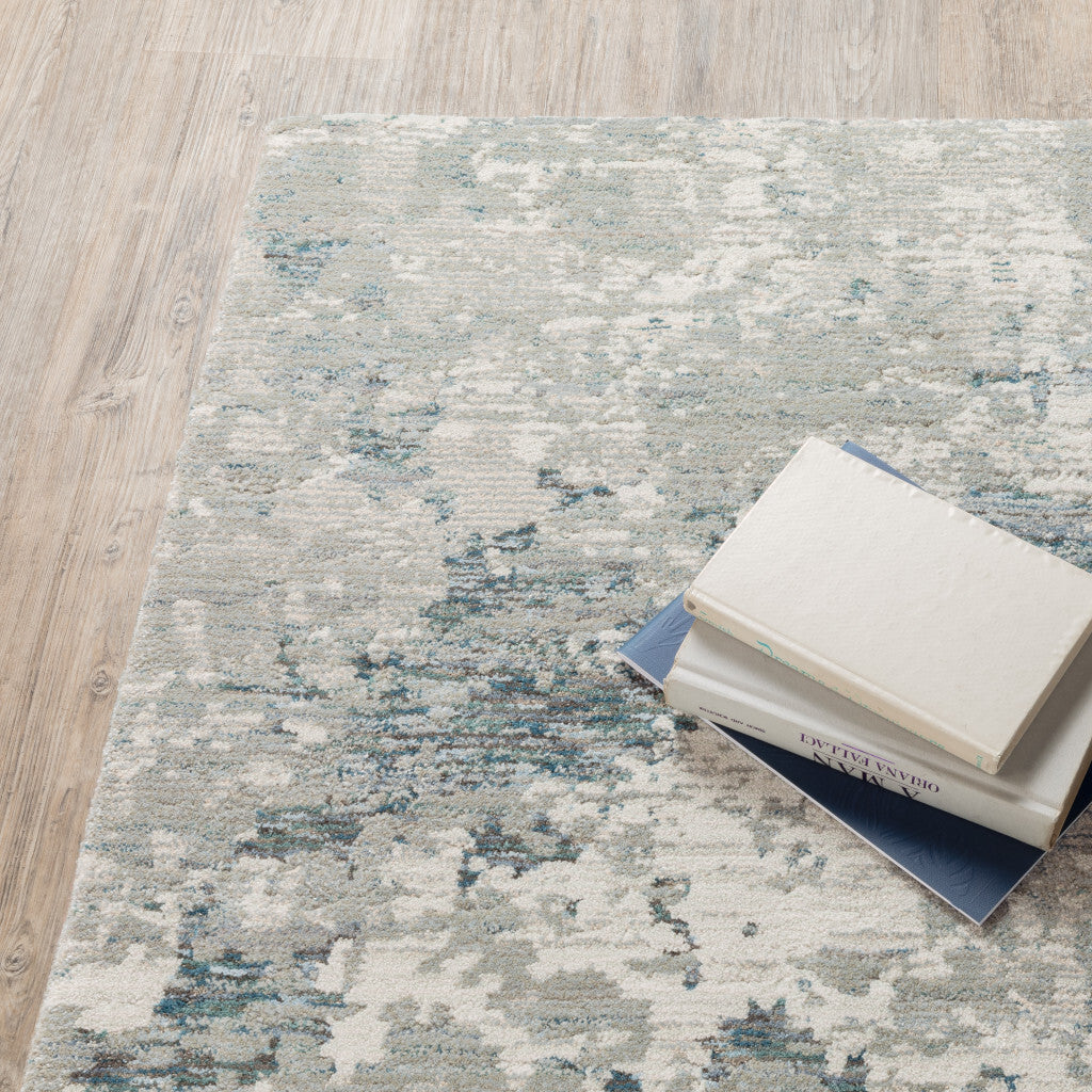 8' X 11' Blue and Beige Abstract Power Loom Area Rug
