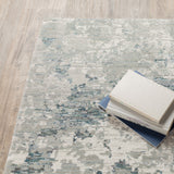 8' X 11' Blue and Beige Abstract Power Loom Area Rug