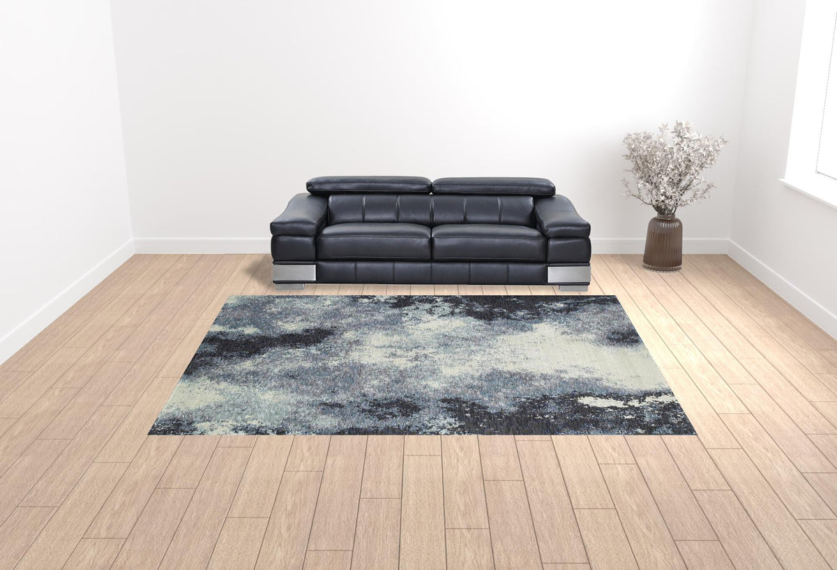 10' X 13' Blue and Ivory Abstract Power Loom Area Rug