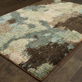 8' X 11' Blue and Ivory Abstract Power Loom Area Rug