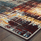 10' X 13' Blue and Orange Abstract Power Loom Area Rug