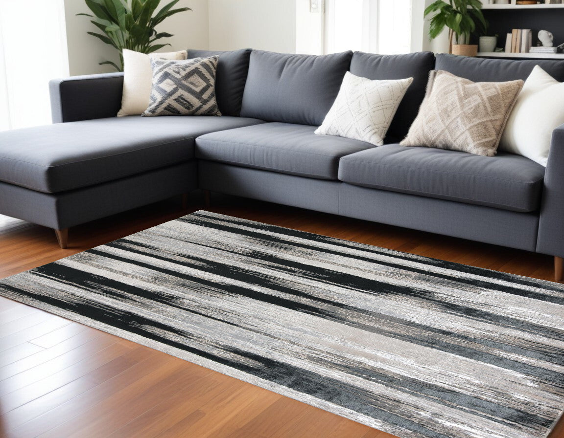 10' X 13' Beige and Black Abstract Power Loom Area Rug