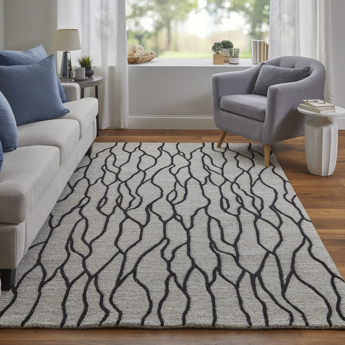 8' X 11' Taupe Black And Gray Wool Abstract Tufted Handmade Stain Resistant Area Rug