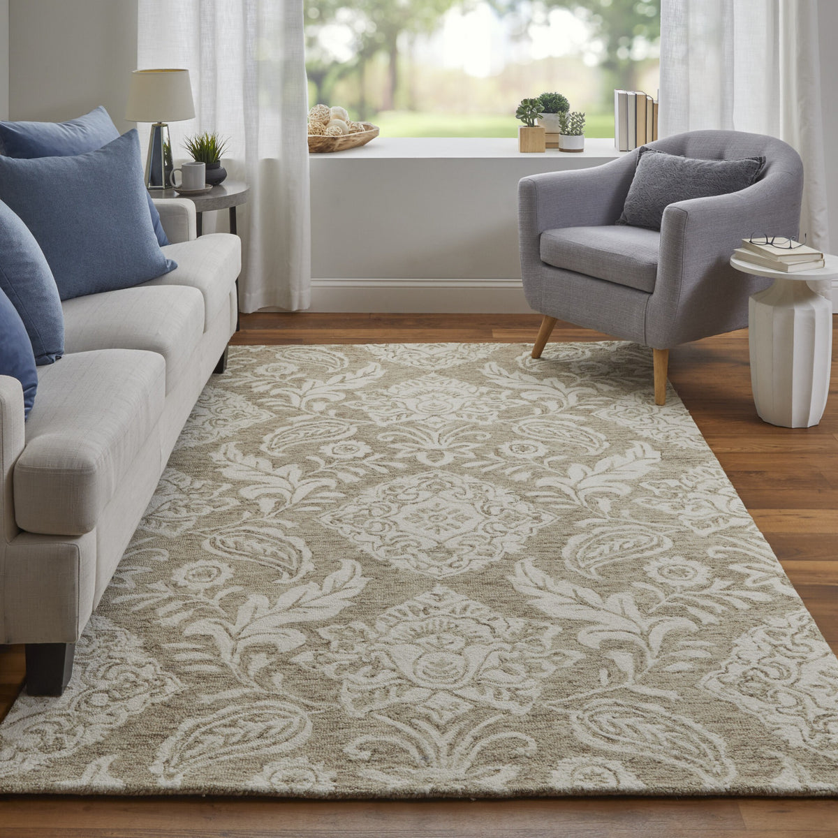 9' X 12' Tan And Ivory Wool Paisley Tufted Handmade Stain Resistant Area Rug