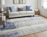 10' X 13' Blue Green And Ivory Abstract Power Loom Distressed Area Rug