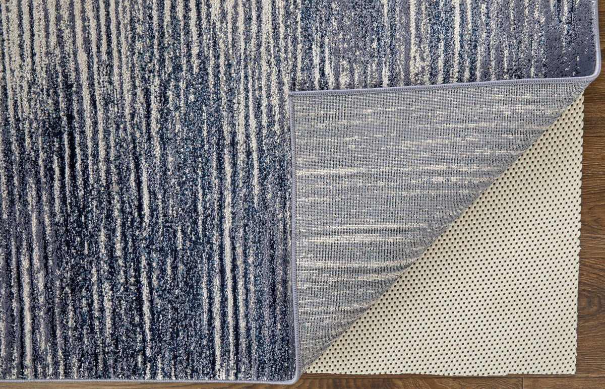 10' X 13' Blue Gray And Ivory Striped Power Loom Distressed Area Rug