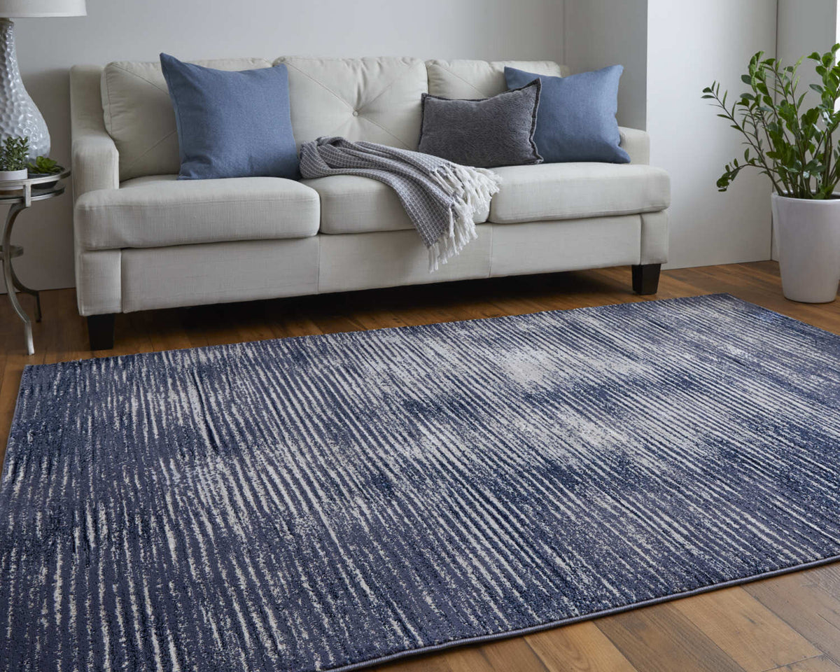 10' X 13' Blue Gray And Ivory Striped Power Loom Distressed Area Rug