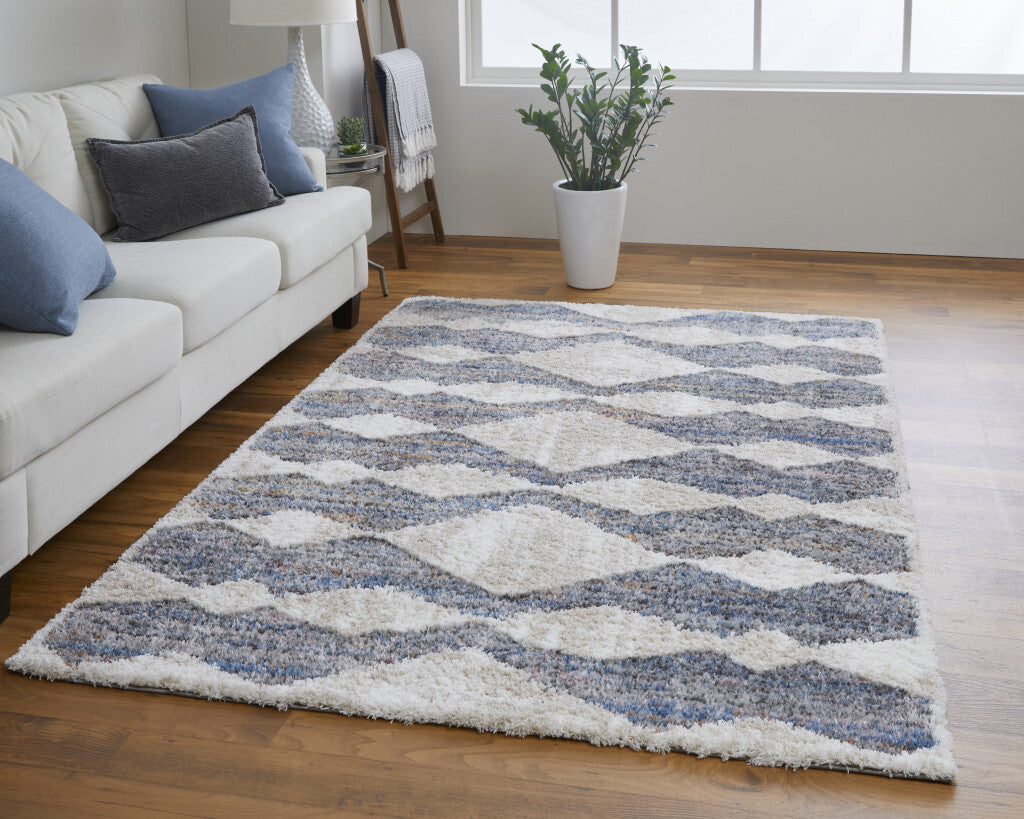 10' X 14' Tan Ivory And Blue Chevron Power Loom Stain Resistant Area Rug
