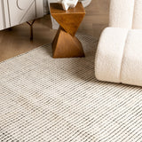 8' X 11' Beige and Black Checkered Power Loom Distressed Area Rug