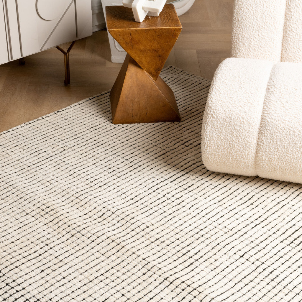 8' X 11' Beige and Black Checkered Power Loom Distressed Area Rug