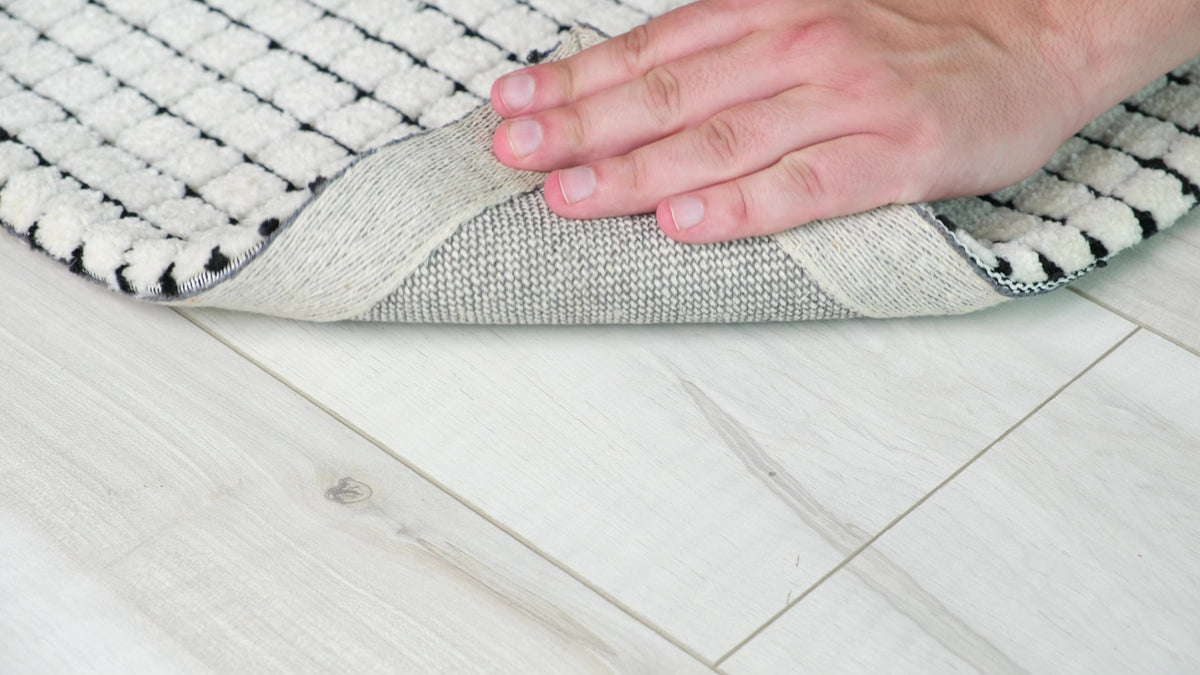 8' X 11' Beige and Black Checkered Power Loom Distressed Area Rug