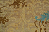4' X 6' Tan Blue and Brown Floral Hand Knotted Area Rug