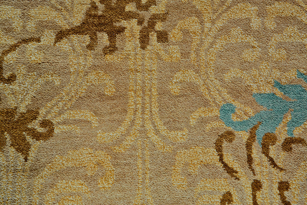 4' X 6' Tan Blue and Brown Floral Hand Knotted Area Rug