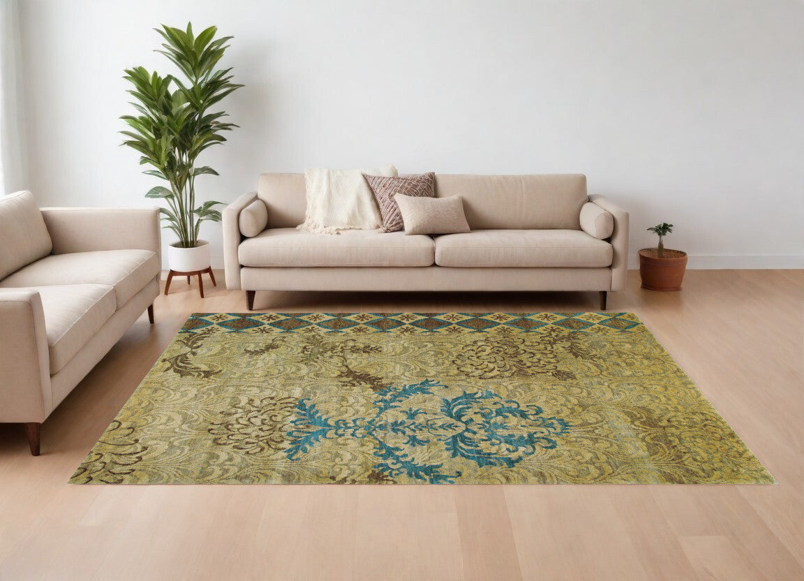 8' X 12' Tan Blue and Brown Floral Hand Knotted Area Rug
