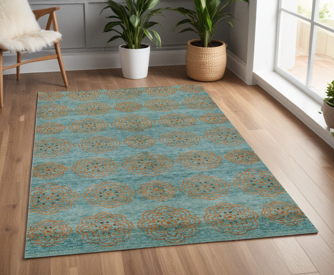 4' X 6' Green Blue and Taupe Floral Hand Knotted Worn Faded Area Rug