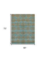 4' X 6' Green Blue and Taupe Floral Hand Knotted Worn Faded Area Rug