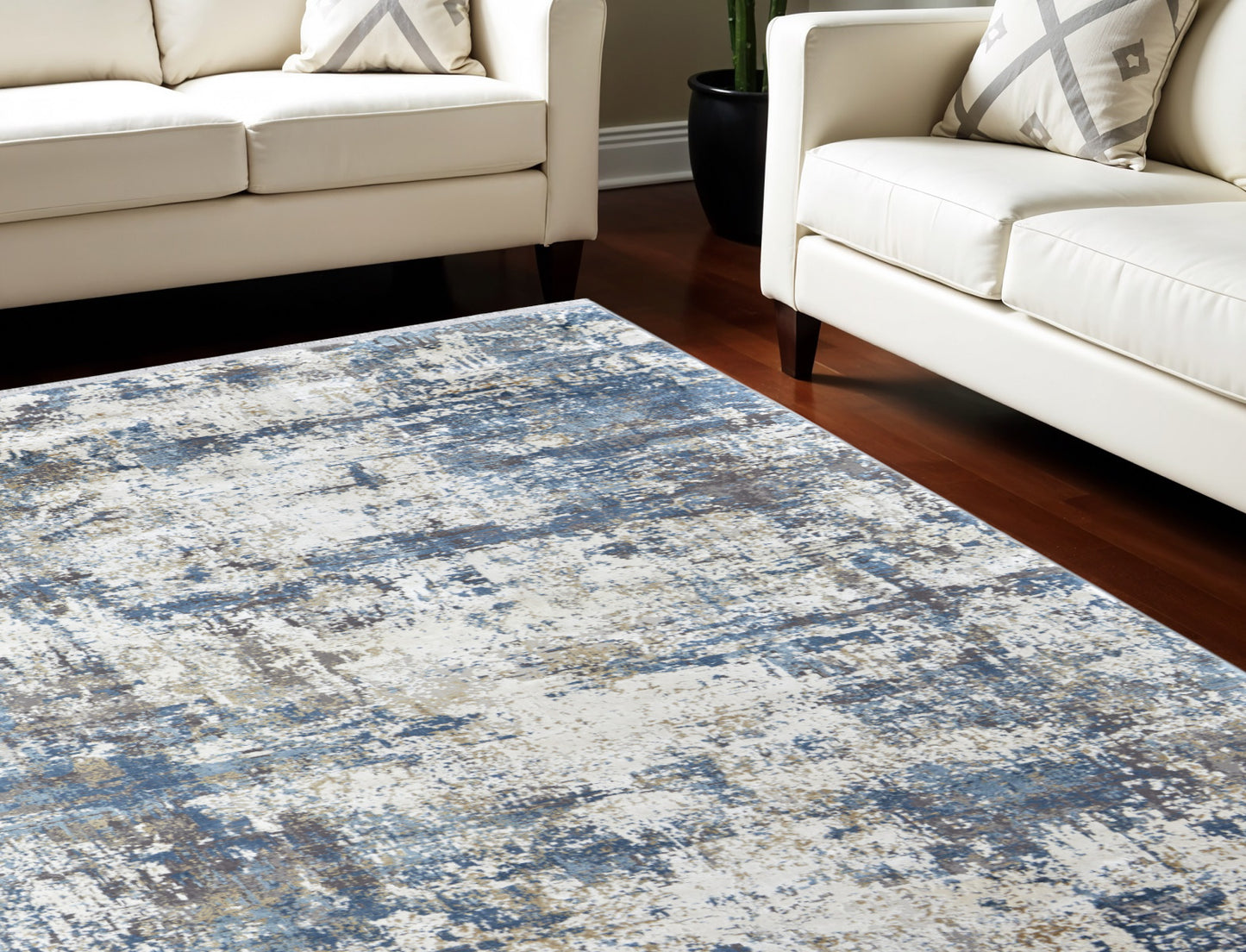 12' X 18' Ivory Tan and Blue Abstract Power Loom Area Rug With Fringe