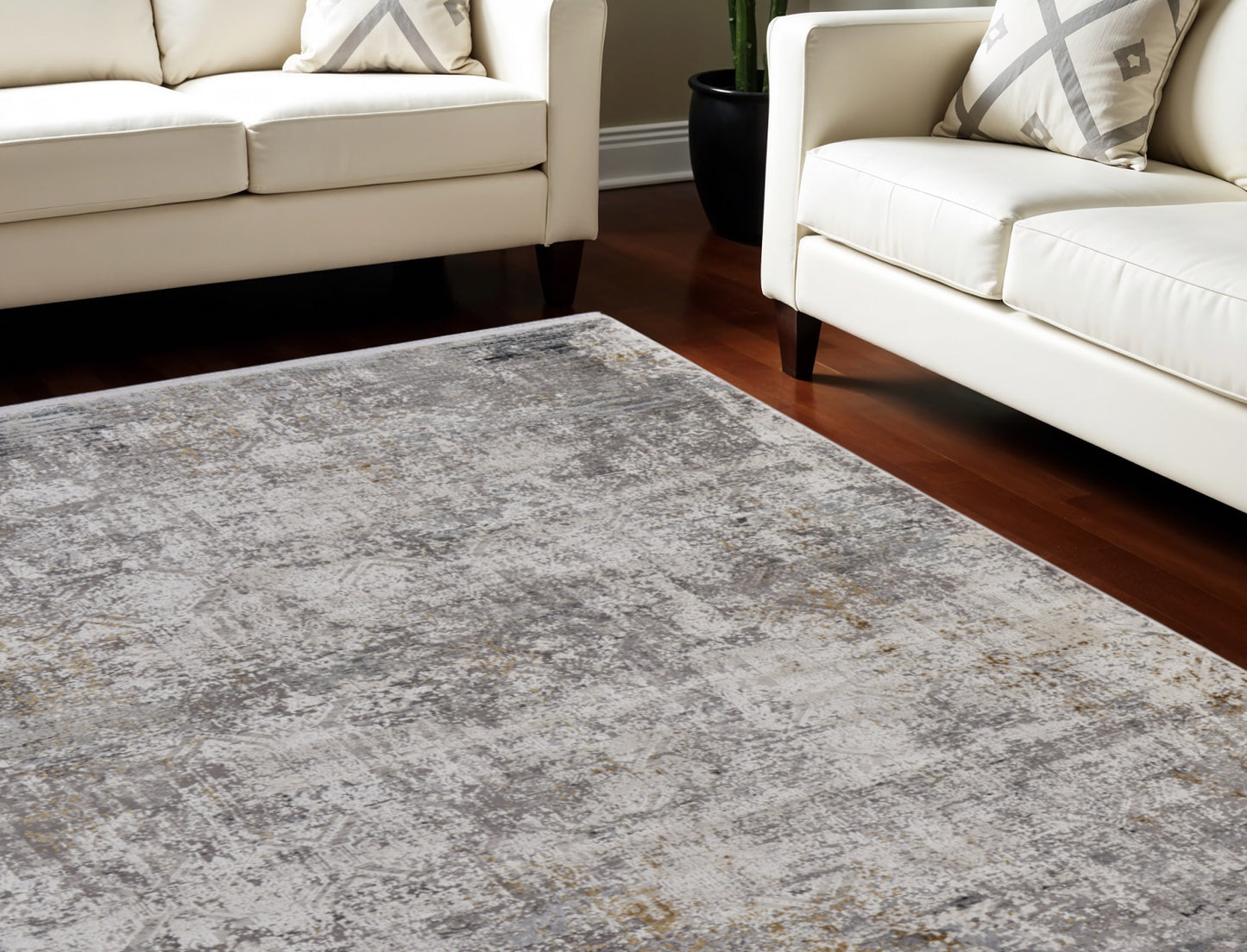 7' X 10' Ivory Taupe and Gray Abstract Power Loom Distressed Area Rug With Fringe