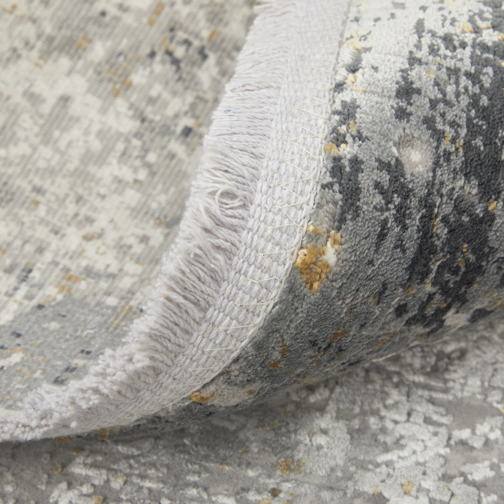 13' X 20' Ivory Taupe and Gray Abstract Power Loom Distressed Area Rug With Fringe