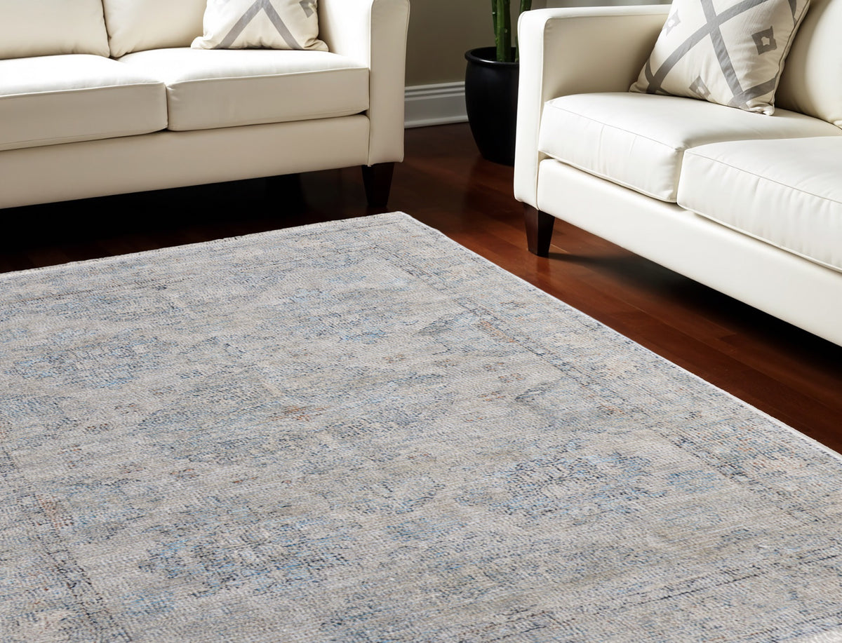 8' X 10' Gray Blue and Taupe Oriental Hand Woven Distressed Area Rug With Fringe