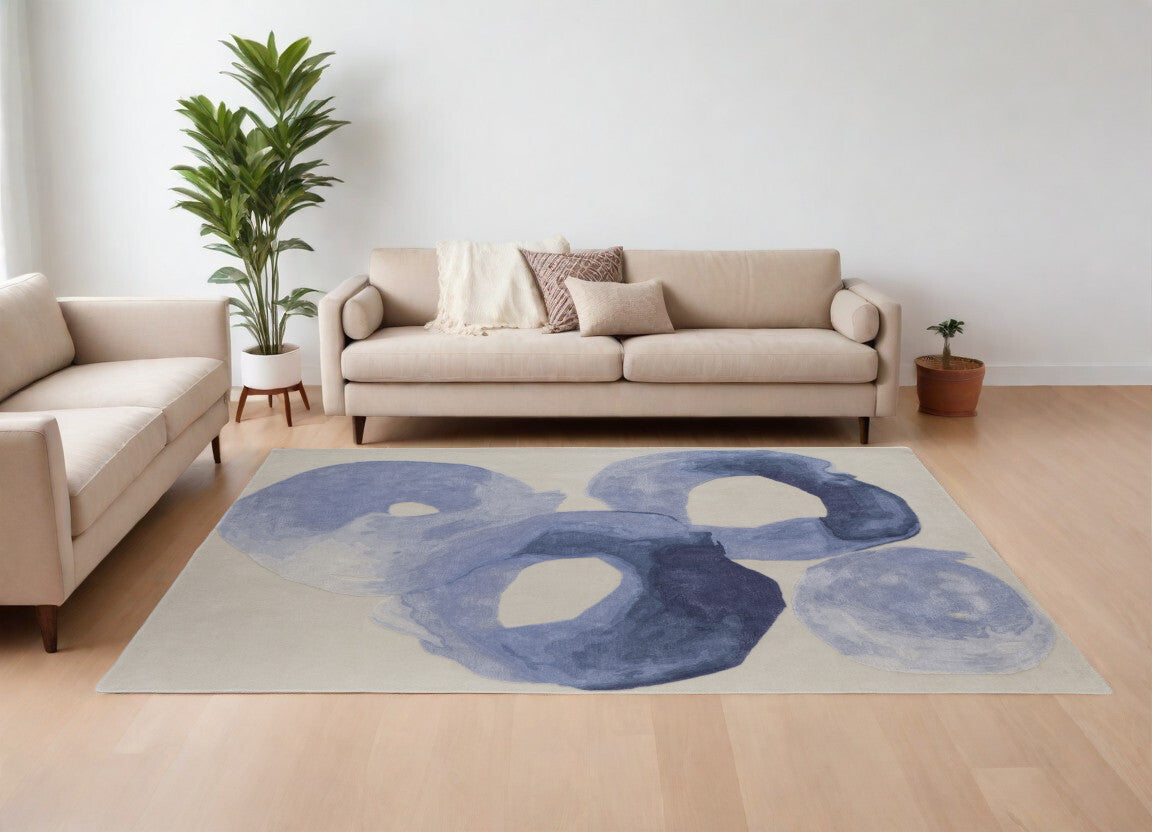 9' X 12' Blue and Ivory Abstract Hand Tufted Area Rug