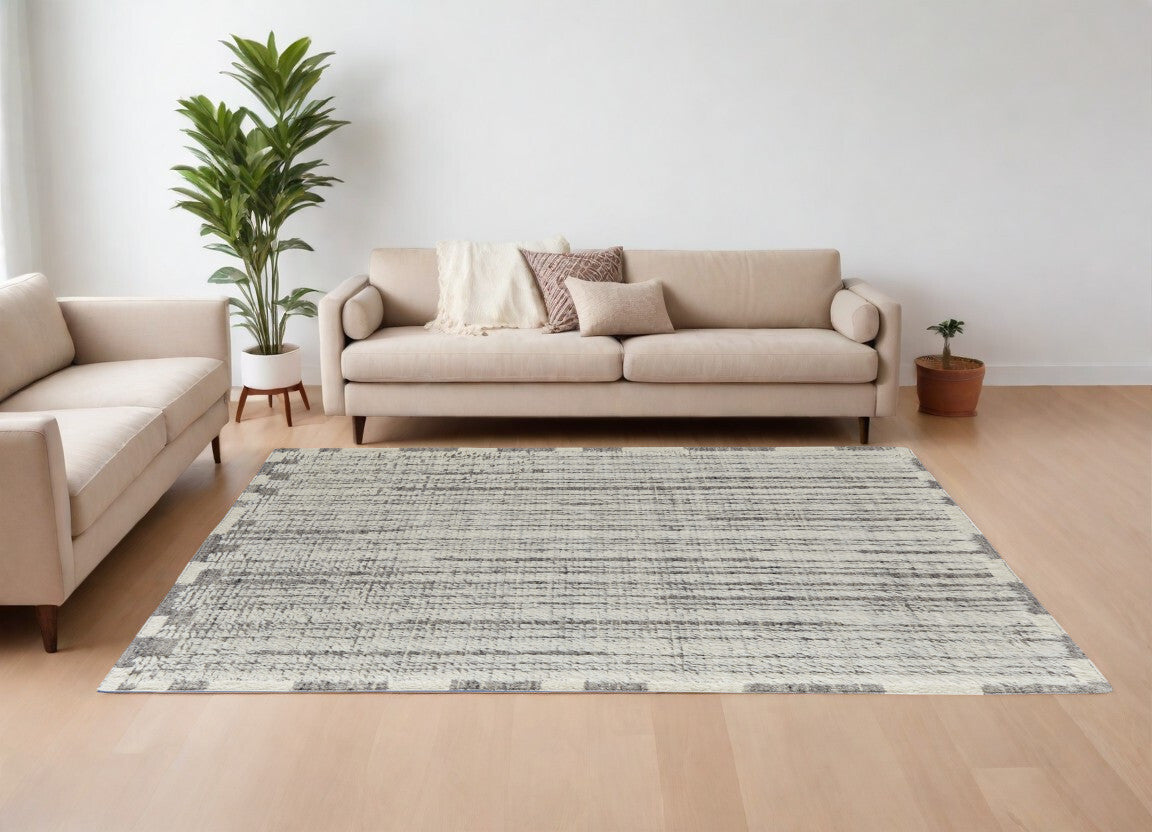 6' X 9' Gray and Ivory Wool Striped Hand Woven Area Rug