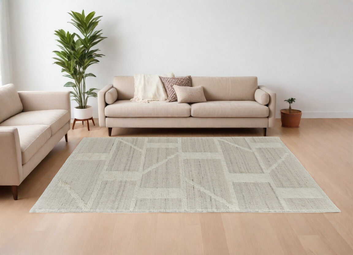 6' X 9' Tan and Ivory Wool Geometric Hand Woven Area Rug