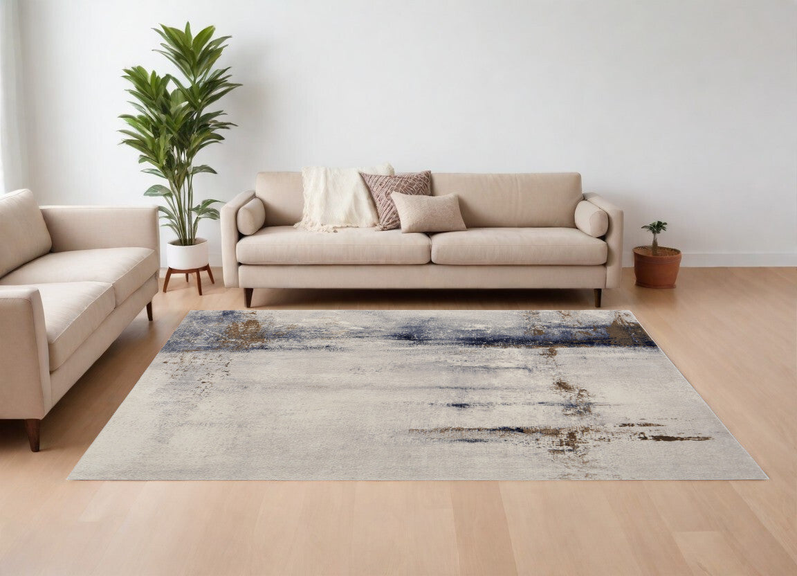 10' X 13' Ivory Blue and Brown Abstract Power Loom Area Rug