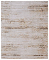 9' X 13' Ivory and Tan Abstract Power Loom Worn Faded Area Rug