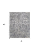 4' X 6' Gray and Silver Abstract Hand Woven Worn Faded Area Rug