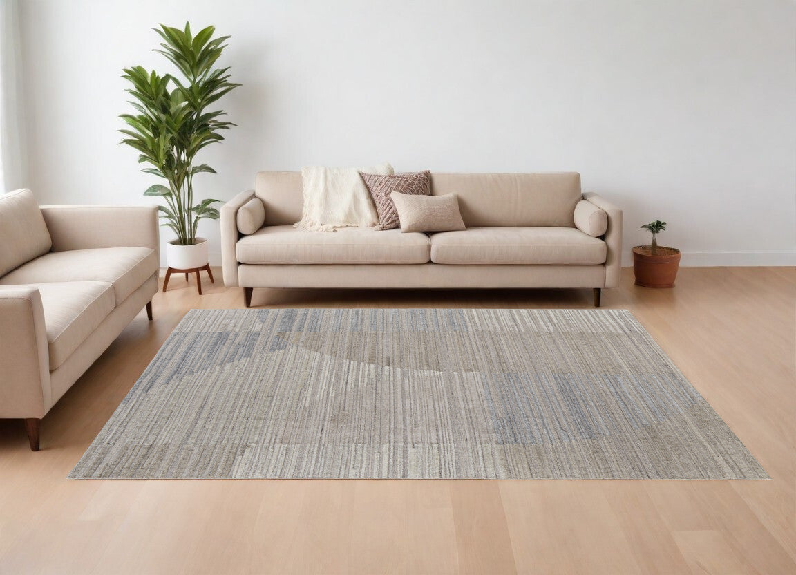 10' X 14' Tan and Blue Abstract Hand Woven Worn Faded Area Rug