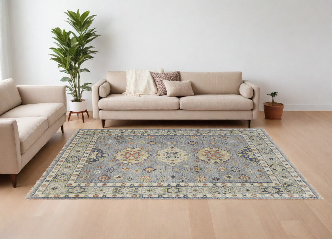 9' X 12' Gray Blue and Taupe Wool Geometric Hand Knotted Area Rug With Fringe