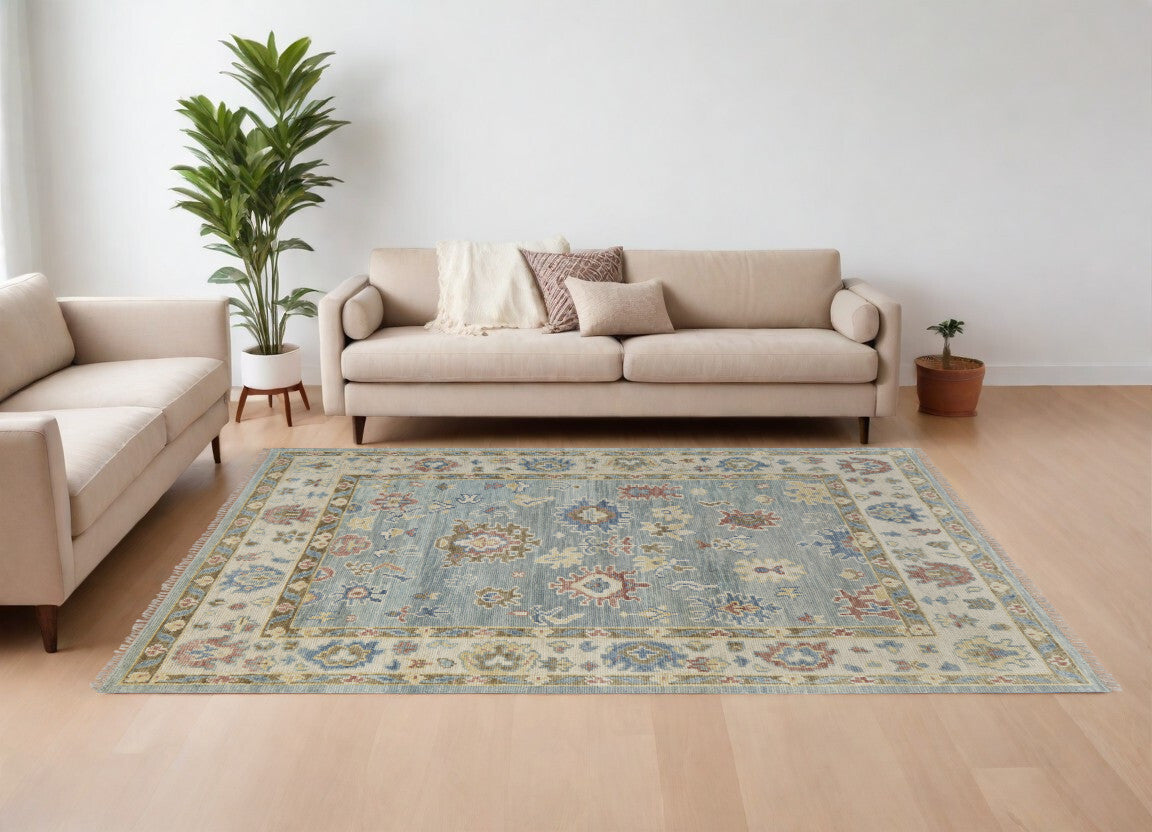 10' X 14' Blue Ivory and Yellow Wool Floral Hand Knotted Area Rug With Fringe