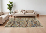 12' X 15' Ivory Blue and Brown Wool Ikat Hand Knotted Area Rug With Fringe