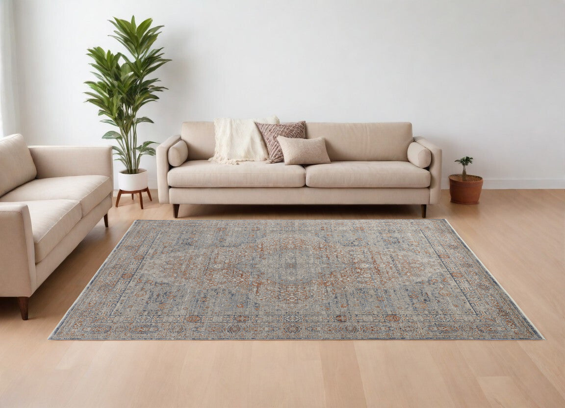 7' X 10' Gray Ivory and Orange Oriental Power Loom Worn Faded Area Rug With Fringe
