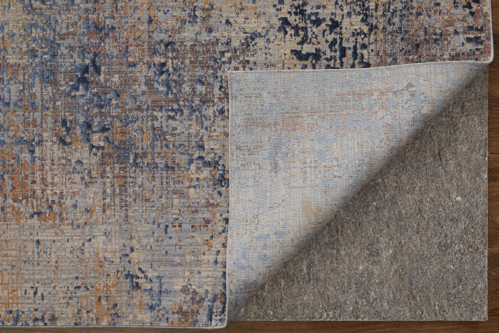 10' X 13' Blue Brown and Tan Abstract Power Loom Area Rug